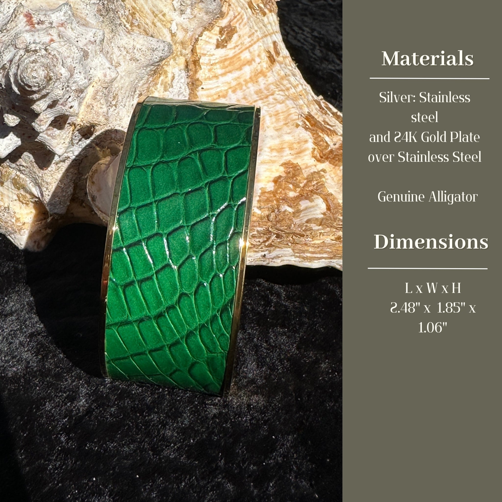 Green crocodile-patterned cufflink on a shell with material and dimensions text.