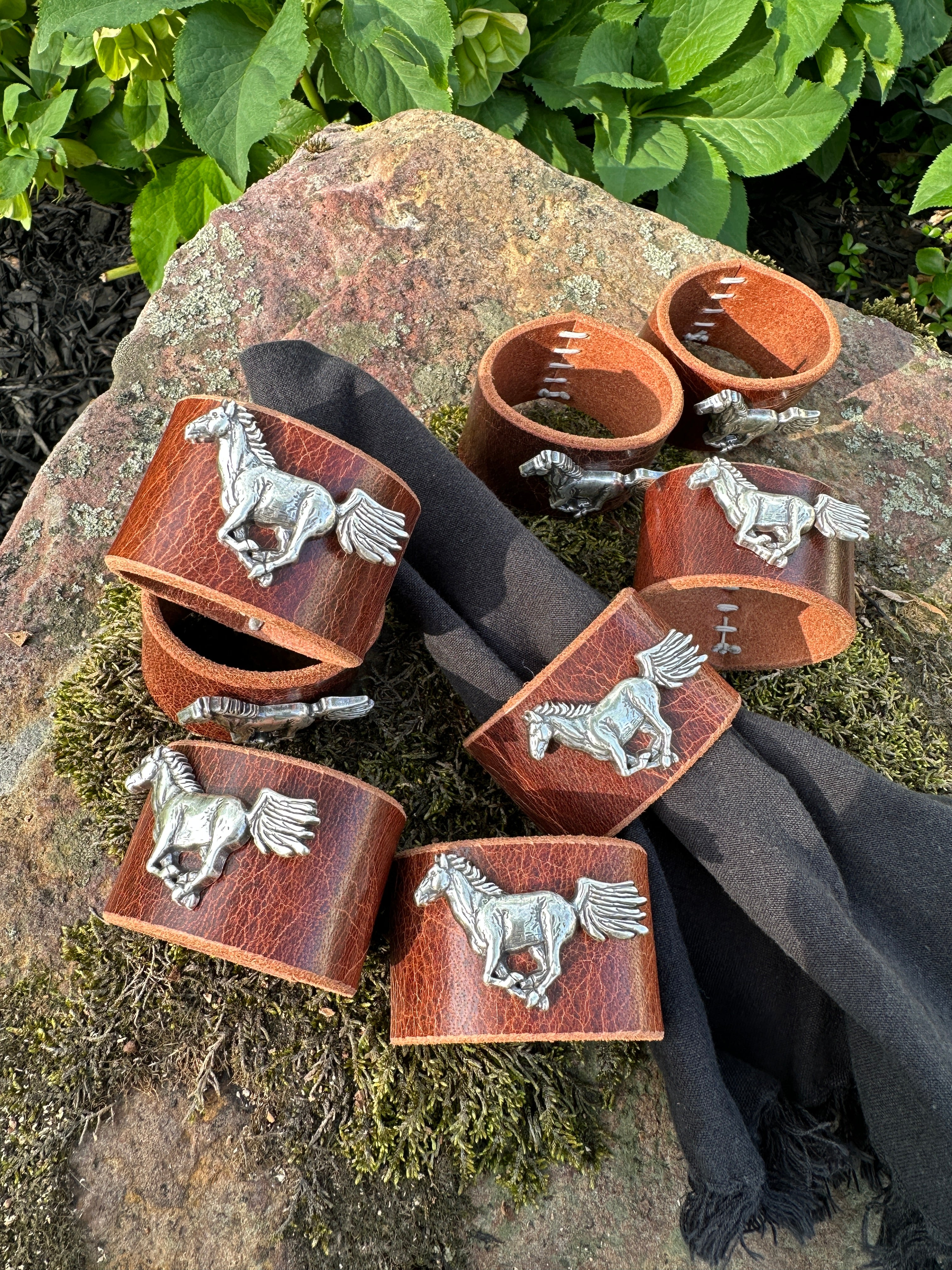 Set of 8 handmade leather napkin rings with equestrian concho detail