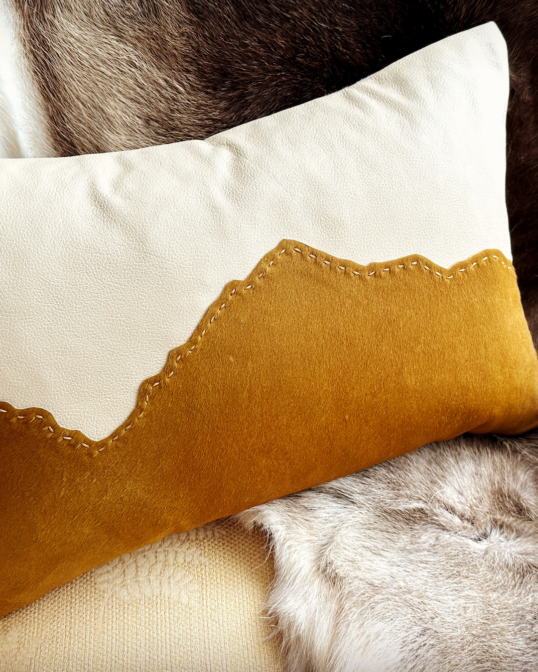 Camelback Mountain range pillow made with leather and calf hair hide