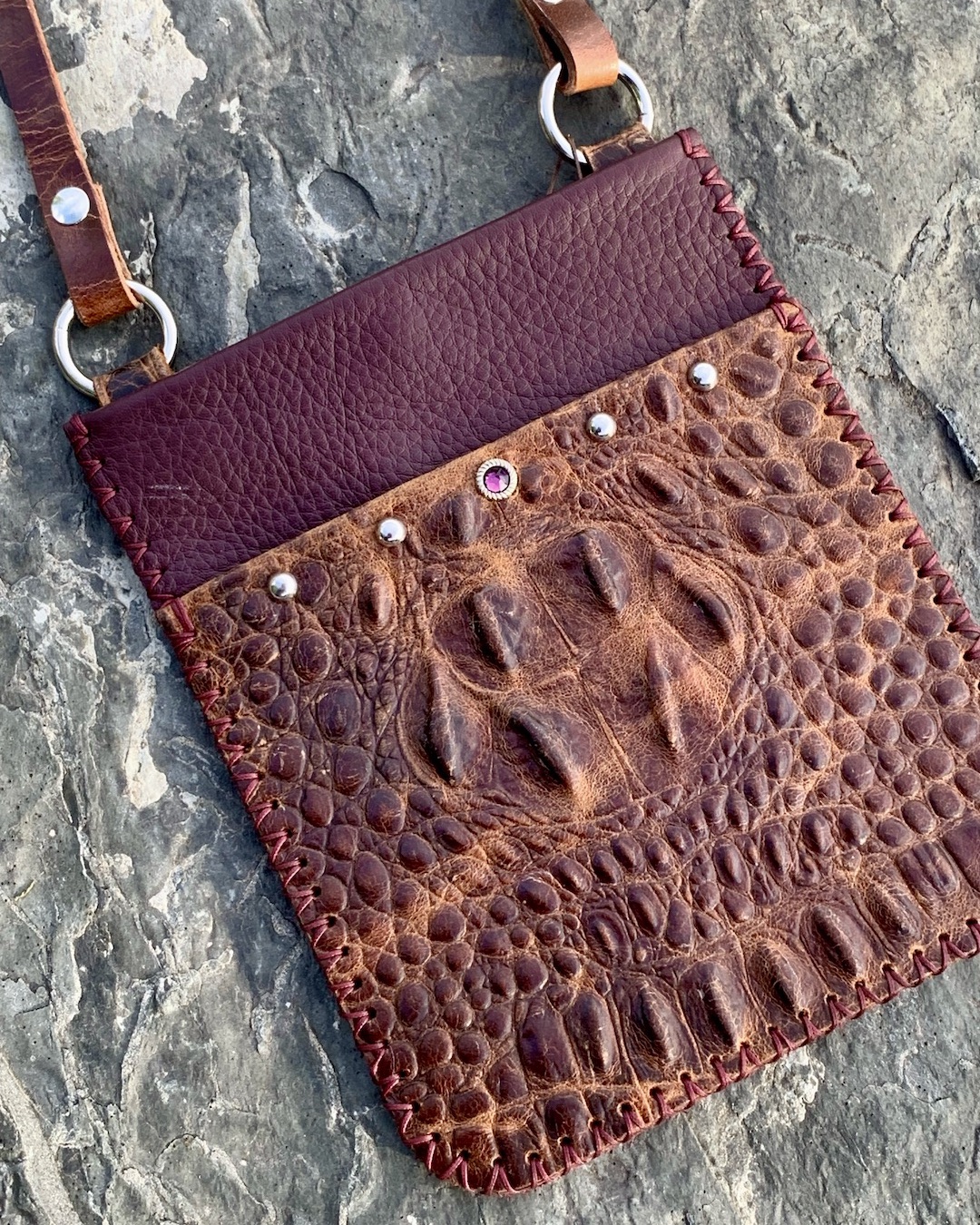 Burgundy leather crossbody bag with croc embossed leather pocket